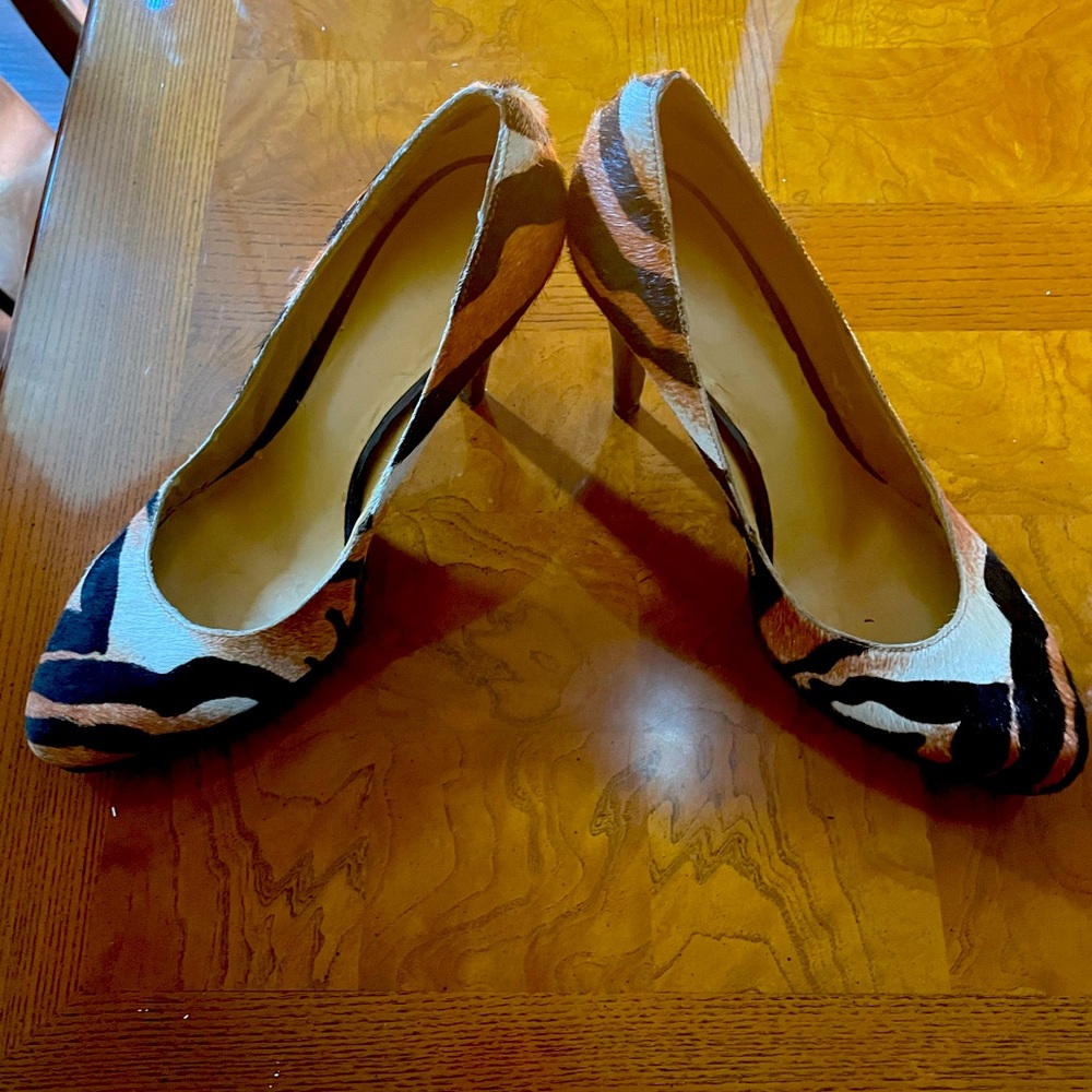 Cow hide pumps.